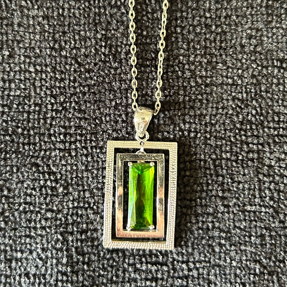 Sterling silver pendant necklace with green gemstone, 2010